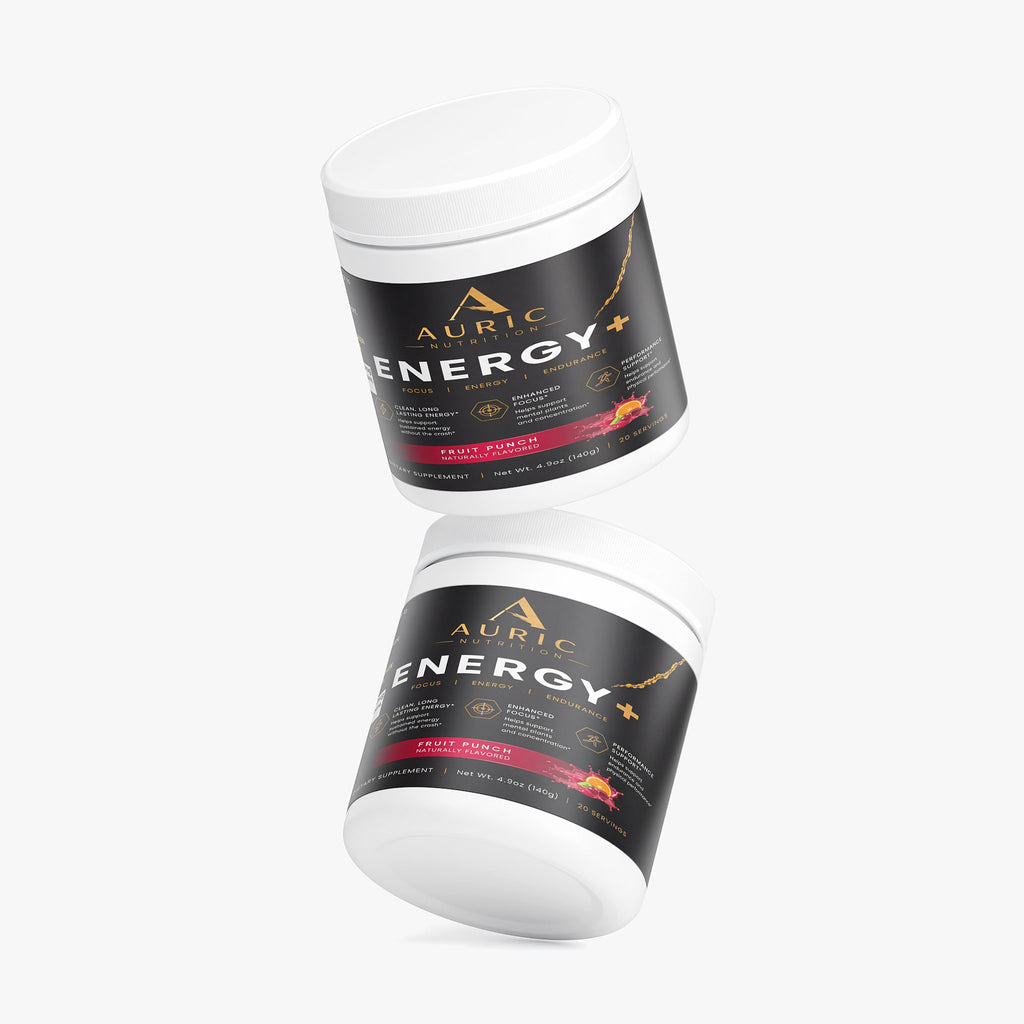Auric Energy fruit punch powder mixed in glass of water